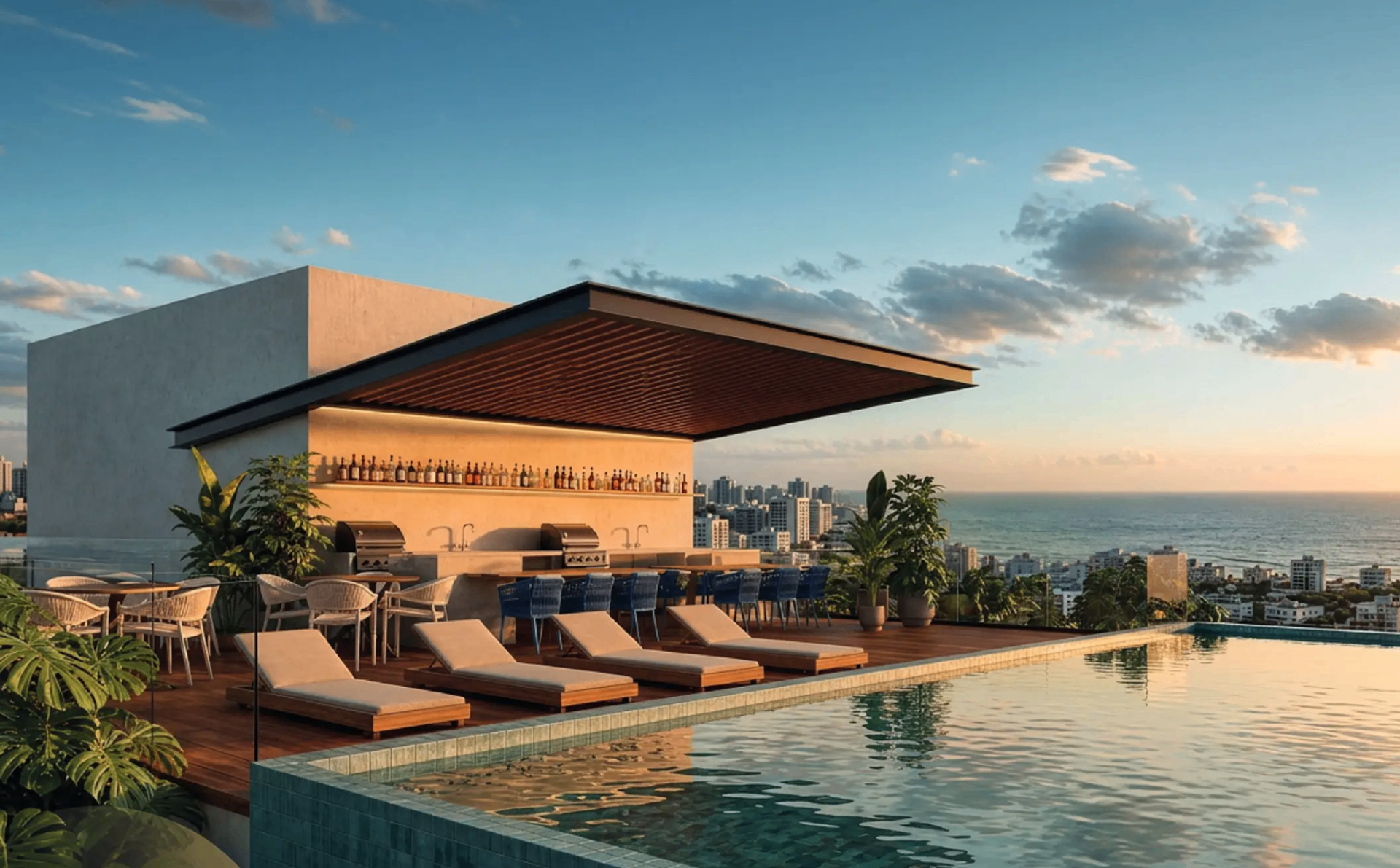 Rooftop com piscina de borda infinita e vista para o mar